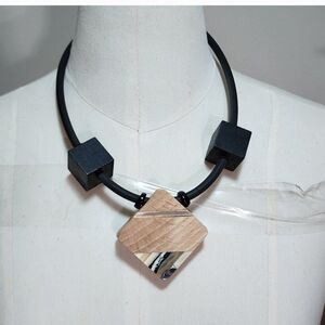 Chunky detailed wooden black rubber necklace